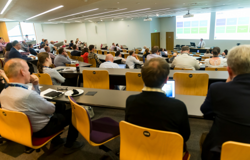 Research_Retreat 2024 Attendees Listening to Speaker