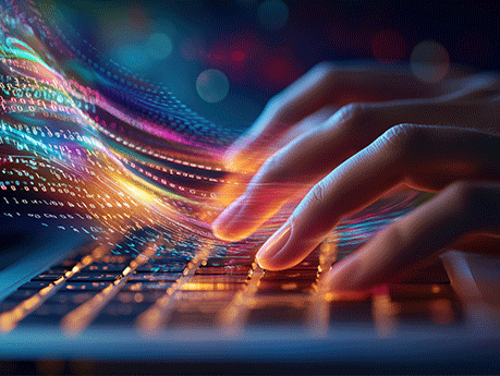 A hand is typing on a laptop keyboard with colorful lines and numbers. Concept of creativity and innovation, as the hand is using the keyboard to input data or code.