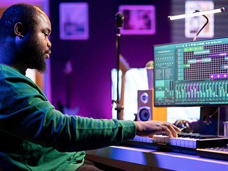 Musician playing piano keyboard and recording tracks for mix and master session, using digital software on pc to create new songs. Sound producer composing music with midi controller tool.