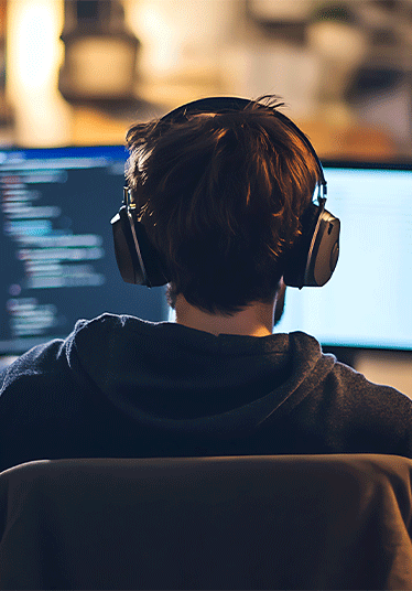 A programmer writing code for a machine learning algorithm in Python]