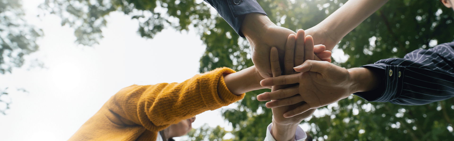 ESG,empathy,partnership and Social connection.Business people join hands together for CSR,corporate social responsibility.World environment day.Global community teamwork.Charity,volunteer, partnership