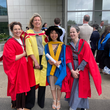 PhD graduate with three academics