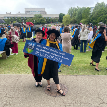 PhD student with academic at UCD graduation