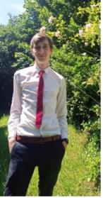 Robert Eves head & body to waist shot with vegetation in background