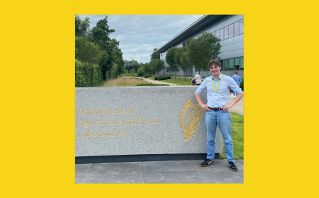 Philip Becker Smiling Standing Outside The Department of Agriculture and Food Laboratories in a Yellow Frame